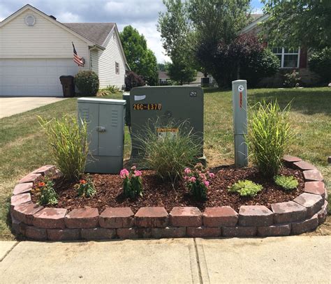 decoration near yard electrical boxes|landscaping with utility boxes.